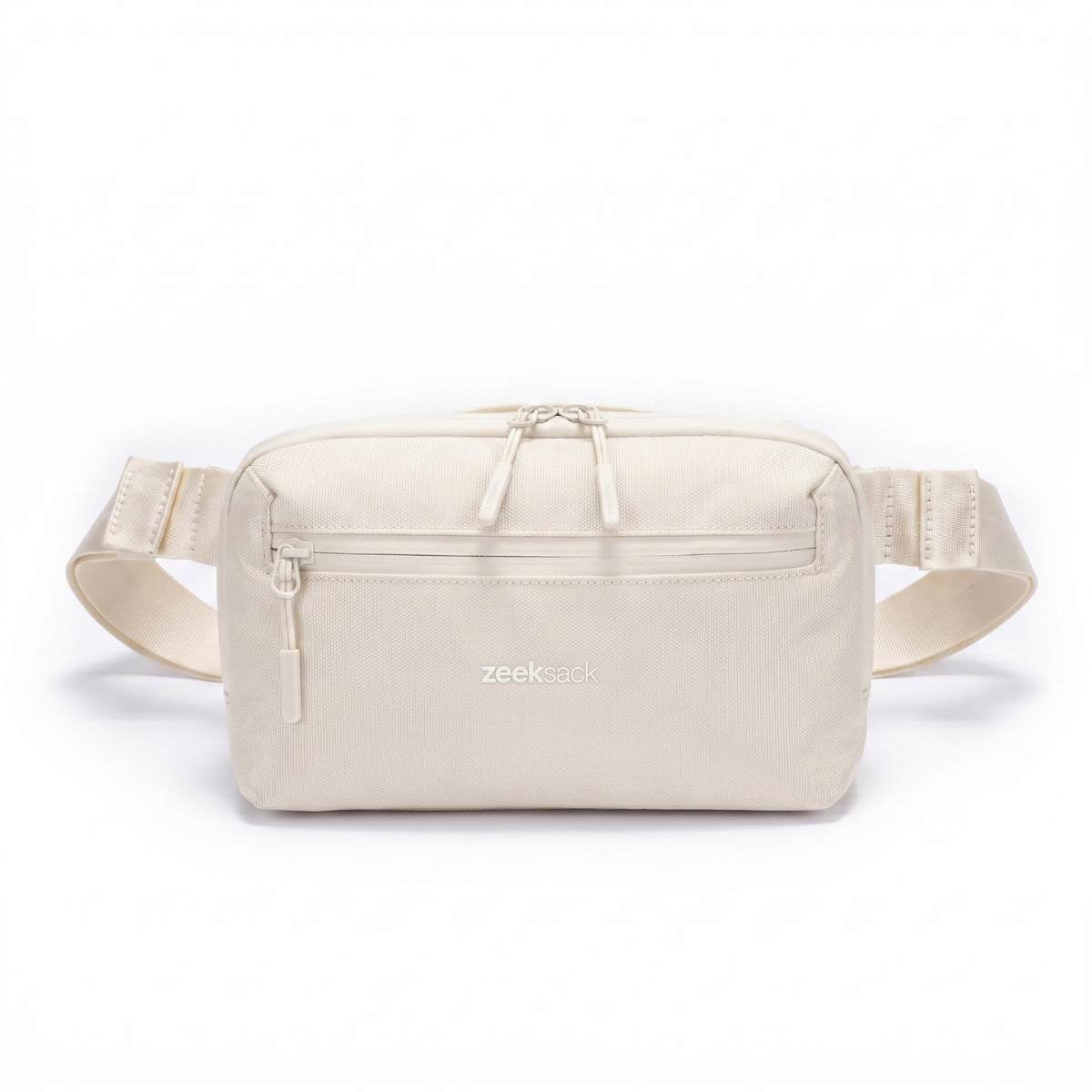 Zeeksack Crossbody Organizer (sandbeige) – Schultergurt und Reißverschlussfach vorne.