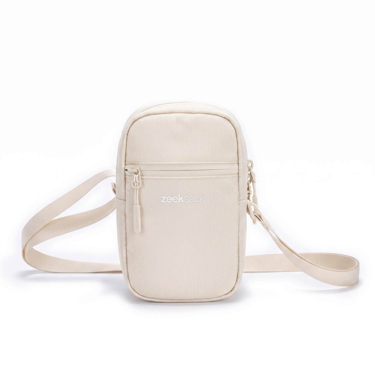 Zeeksack Travel Pouch (sandbeige) – Schultergurt und Reißverschlussfach vorne.