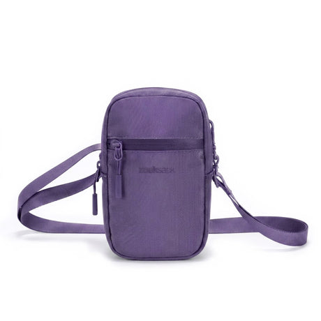Zeeksack Travel Pouch (lila) – Schultergurt und Reißverschlussfach vorne.
